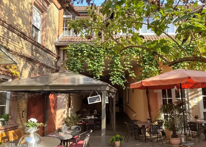 Alojamento de Acomodação e Pequeno-almoço Weingut Weinstube Weinhotel Wolf